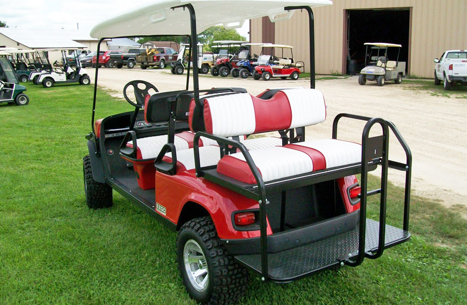 Red 6 seater with seat on back - Rearview